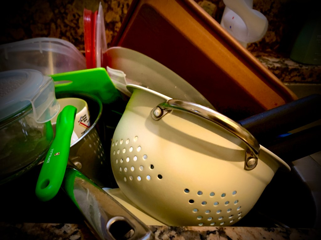 a sink full of dishes